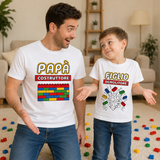 Coppia di t-shirt bianche Papà "COSTRUTTORE" e Figlio "DEMOLITORE" con grafica a blocchi