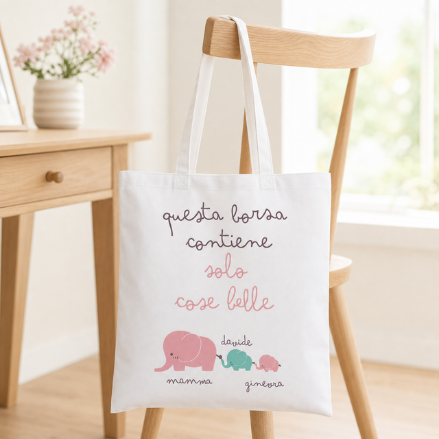 Borsa tote bianca con scritta “questa borsa contiene solo cose belle” e elefantini