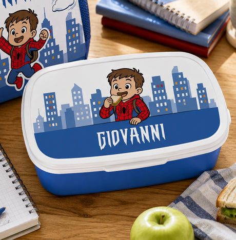 Scatola portamerenda blu con coperchio bianco, grafica città e nome 'GIOVANNI'.